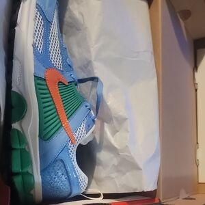 Nike Blue and Green Sneakers with Orange Swoosh Vomero